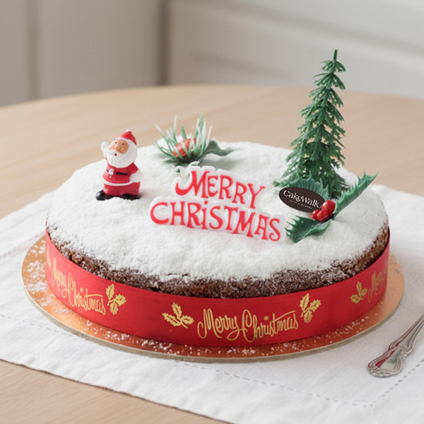 Traditional Christmas Plum  Cake with Sugar Dusting