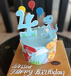DINOSAUR THEME CAKE